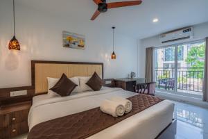 Postel nebo postele na pokoji v ubytování Mughal Suites + 37 fotografií