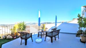 A balcony or terrace at Los Caňos II - Calm Home - Option cheap parking