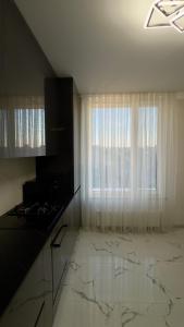 TV a/nebo společenská místnost v ubytování CityView Lodge