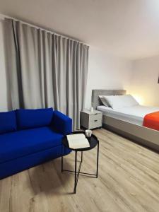 Кровать или кровати в номере Apartmani Seka