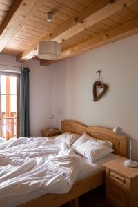 Un pat sau paturi într-o cameră la Sprechenstein