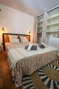 Postel nebo postele na pokoji v ubytování Villa O'Mangos frangipanier + 31 fotografií