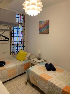 Postel nebo postele na pokoji v ubytování Apartamento el Carmen