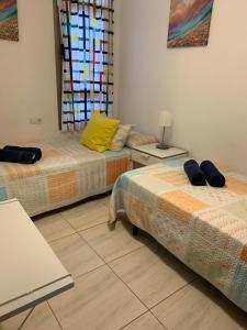 Postel nebo postele na pokoji v ubytování Apartamento el Carmen