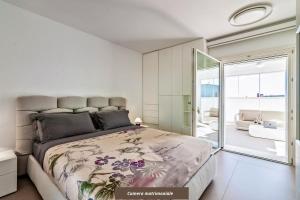 Ένα ή περισσότερα κρεβάτια σε δωμάτιο στο De Candia Luxury House - Lecce Selection