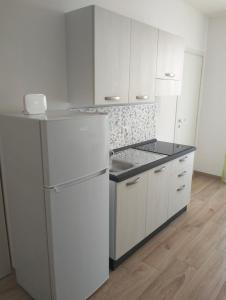 Η κουζίνα ή μικρή κουζίνα στο Diana Apartment
