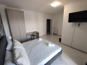 TV a/nebo společenská místnost v ubytování Guest house Sinisi