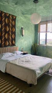 Ένα ή περισσότερα κρεβάτια σε δωμάτιο στο riverside