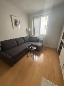 Posezení v ubytování Central Alpha Apartment 7min to the city centar