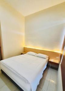 Katil atau katil-katil dalam bilik di Rumah Inap Pesanggrahan