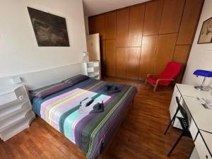 Postel nebo postele na pokoji v ubytování CASABELLA