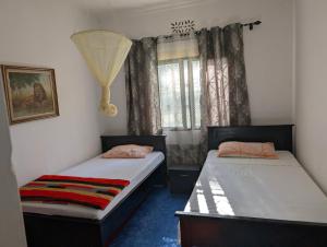 Postel nebo postele na pokoji v ubytování Dans place