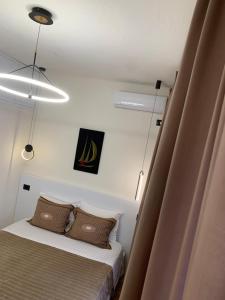 Postel nebo postele na pokoji v ubytování Manga guesthouse