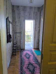 Rúm í herbergi á Guest House Livia