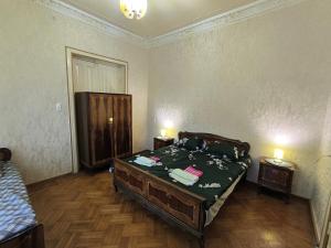 Rúm í herbergi á Guest House Livia