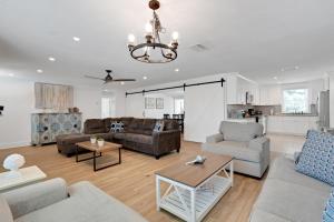 a living room with a couch and a table at Sunset Splash in Siesta Key