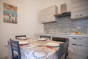 Kuchyň nebo kuchyňský kout v ubytování Samarà Sx + 7 fotografií