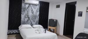 Gallery image of Hotel Centrica Del Palo 45 in Medellín +18 photos