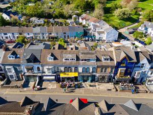 an aerial view of a small town with houses at Castleview Coastal Comfort in Oystermouth