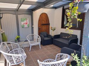 Posezení v ubytování Le chalet d Egide + 1 fotografie