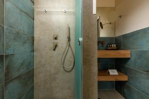 Vannituba majutusasutuses ALEA Hotel & Suites
