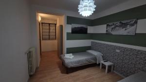Postel nebo postele na pokoji v ubytování Albergo Valentini