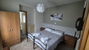 Postel nebo postele na pokoji v ubytování Albergo Valentini
