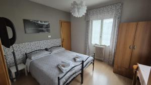 Postel nebo postele na pokoji v ubytování Albergo Valentini