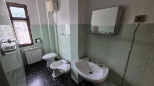 Koupelna v ubytování Albergo Valentini