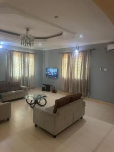 TV a/nebo společenská místnost v ubytování Cubic Apartment