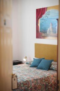 Postel nebo postele na pokoji v ubytování Le Tare B&B