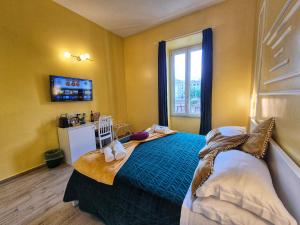 TV a/nebo společenská místnost v ubytování Residenze Serventi Longhi