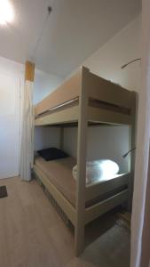 a bunk bed in a small room with a bunk beduteneway at St RAPHAEL VALESCURE CASA in Saint-Raphaël