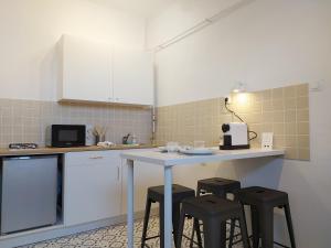 Kuchyň nebo kuchyňský kout v ubytování Atelier Keszthely