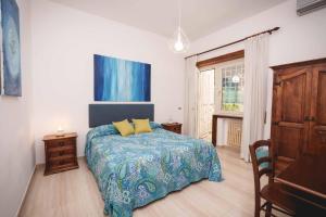 Postel nebo postele na pokoji v ubytování Le Tare B&B