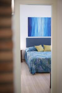 Postel nebo postele na pokoji v ubytování Le Tare B&B