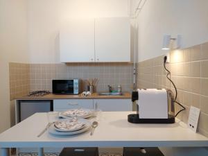 Kuchyň nebo kuchyňský kout v ubytování Atelier Keszthely