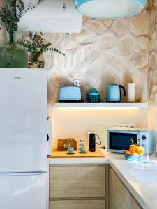 Kuchyň nebo kuchyňský kout v ubytování Moona Hostal Altea