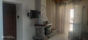 A television and/or entertainment centre at Casa Vacanze Etna