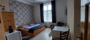 Postel nebo postele na pokoji v ubytování Willa Wiselka