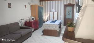 A bed or beds in a room at Casa Vacanze Etna
