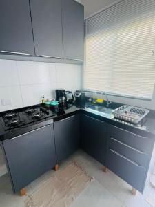 Kuchyň nebo kuchyňský kout v ubytování Residencial Yama