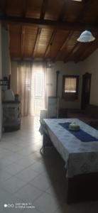 A bed or beds in a room at Casa Vacanze Etna