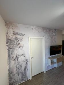 TV a/nebo společenská místnost v ubytování Apartments Duje