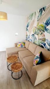 Χώρος καθιστικού στο Modern BohoTropical apartment with terrace