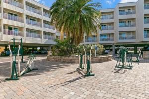 a building with a bunch of gym equipment in front of it at Beautiful Two Bedroom, Two Bath Condo at Sailport in Tampa