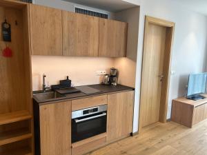 A kitchen or kitchenette at Dining & Living Alpenrose