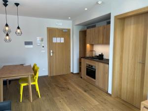 A kitchen or kitchenette at Dining & Living Alpenrose