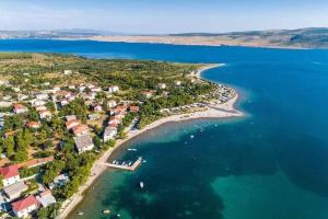 an aerial view of a small island in the water at Apartmani Frane in Seline