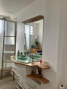 Photo de la galerie de l'établissement Ananas appart, à Saint-Denis 19 autres photos